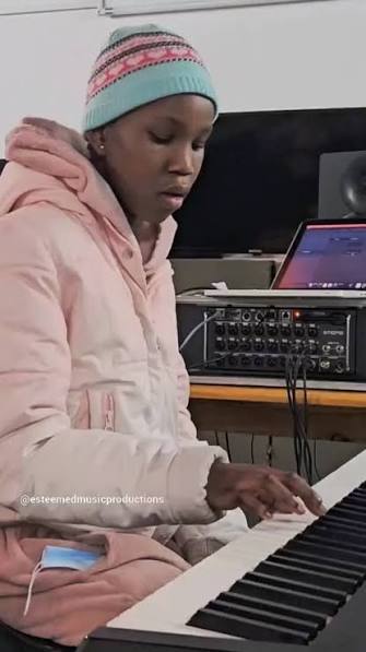 Student practicing piano at Esteemed Music studio